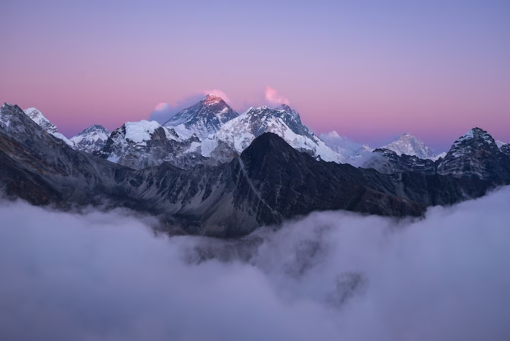 beautiful-scenery-summit-mount-everest-covered-with-snow-white-clouds_181624-21317.png