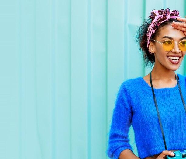 outdoor-lifestyle-image-fashionable-black-woman-bright-wool-sweater-colorful-headband-hairs_273443-1863_1.jpg
